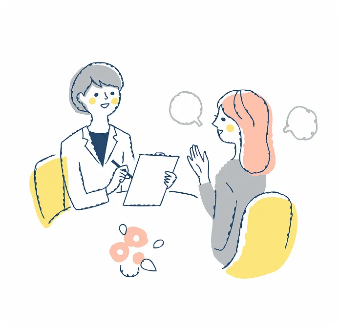 小児科医と母親が話しているイラスト